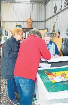  ?? Photo / Supplied ?? Members of the Ka¯whia Art Group prepare for this weekend’s annual Spring Fling Art Festival.