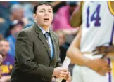  ?? AP ?? New Mexico State suspended operations of its men’s basketball program indefinite­ly Friday night and placed its coaching staff, including Greg Heiar, pictured as an LSU assistant coach in 2019, on paid administra­tive leave.