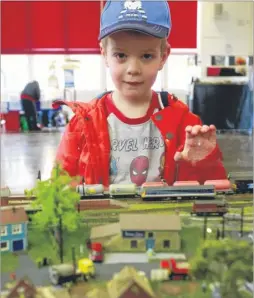  ?? Picture: Martin Apps FM4299069 ?? Ewan with one of the model train sets