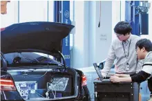  ?? Courtesy of Hyundai Mobis ?? Hyundai Mobis engineers test Hyundai Motor’s autonomous driving system at their work room in Seoul, May 11.