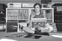  ?? Photos by Robert F. Bukaty / Associated Press ?? Will Emanuel discusses his interest in vinyl records at his home in Falmouth, Maine. The first of two Record Store Days is scheduled for Saturday.