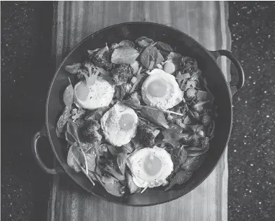  ?? PETER J THOMPSON / NATIONAL POST ?? Broccoli and spinach shakshuka is a dish that originated in the Middle East and now has many versions.