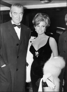  ?? KEYSTONE PRESS AGENCY — ZUMA PRESS ?? James Stewart, left, and Raquel Welch at the London premiere of the 20th Century Fox film “The Flight of the Phoenix,” at the Carlton Theatre on Jan. 21, 1966.