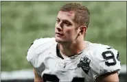  ?? JOHN BAZEMORE — THE ASSOCIATED PRESS ?? In this Nov. 29, 2020, file photo, Las Vegas Raiders defensive end Carl Nassib leaves the field after a game against the Falcons in Atlanta. On Monday, Nassib became the first active NFL player to come out as gay, announcing it on Instagram.