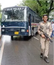  ?? (AFP) ?? This file photo shows a police bus carrying arrested All Parties Hurriyat Conference leaders, at Patiala House Court in New Delhi on July 25