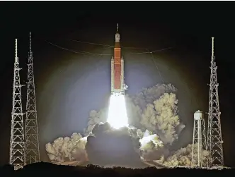  ?? ?? NASA’s unmanned mission to the moon finally gets lift-off – see Question 3
