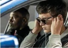  ?? PHOTOS: WILSON WEBB ?? ABOVE: Jamie Foxx and Ansel Elgort get ready to roll. LEFT: The top cast features (from left) Ansel Elgort, Jamie Foxx, Eliza Gonzalez and Jon Hamm in a scene from the movie Baby Driver.