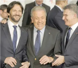  ?? AFP ?? Dimitris Avramopoul­os (C) shares a light moment with Malta Minister for Home Affairs Carmelo Abela (L) and Slovakia’s Minister of Interior Robert Kalinak at the Grand Masters Palace in Valletta on Thursday.—