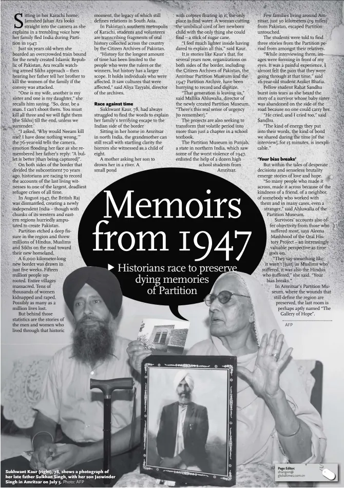  ?? Photo: AFP ?? Sukhwant Kaur ( right), 78, shows a photograph of her late father Sulkhan Singh, with her son Jaswinder Singh in Amritsar on July 5.