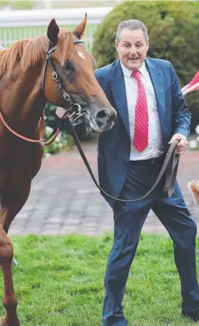  ?? STILL RACING: Trainer Grahame Begg with Blue Diamond Stakes winner Written By. ??