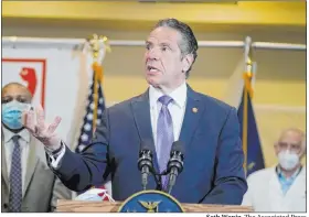  ?? Seth Wenig The Associated Press ?? Gov. Andrew Cuomo speaks Monday at a pop-up vaccine clinic in Mount Vernon, N.Y.