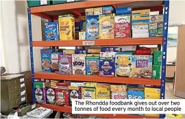  ?? ?? The Rhondda foodbank gives out over two tonnes of food every month to local people