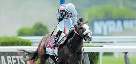  ?? Picture: BRAD PENNER/US TODAY ?? SETTING PACE: Jockey Manuel Franco pumps his fist after winning the 152nd running of the Belmont Stakes aboard Tiz the Law (8) at Belmont Park in the US on Saturday