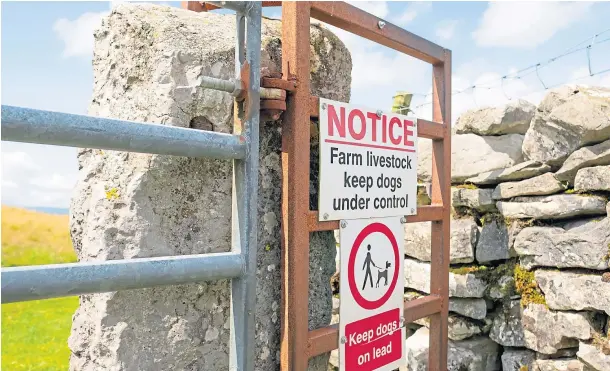  ??  ?? COUNTRYSID­E: Negative signage can add to the disconnect between the general public and anxious farmers worried about their land and crops.