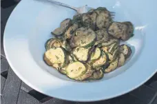  ??  ?? Right, Zucchini Rounds Cooked in Butter, with mint.