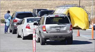  ?? NICK SMIRNOFF / FOR TEHACHAPI NEWS ?? By appointmen­t, the community drive-up COVID-19 testing site, which is in front of Adventist Health Tehachapi Valley, continues as a resource for Tehachapi residents.