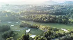  ?? BILLY H.C. KWOK FOR THE NEW YORK TIMES ?? Members have rallied against a government plan to build new housing on a portion of the Hong Kong Golf Club.