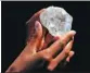  ?? LUCAS JACKSON / REUTERS ?? A model displays the 1,109carat “Lesedi La Rona” diamond at Sotheby’s in New York in May last year.