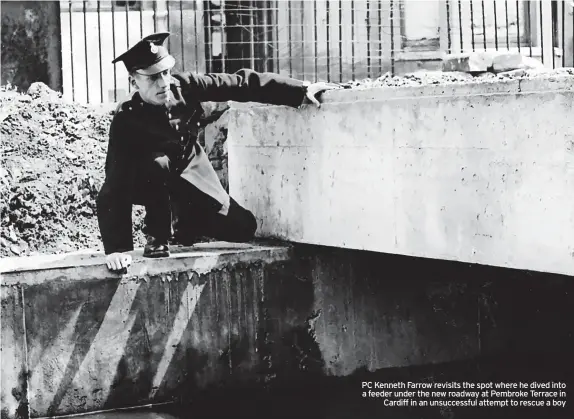  ?? ?? PC Kenneth Farrow revisits the spot where he dived into a feeder under the new roadway at Pembroke Terrace in Cardiff in an unsuccessf­ul attempt to rescue a boy