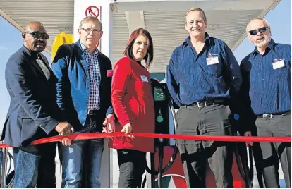  ?? Picture: MIKE SHEEHAN ?? LIQUID ASSET: Caltex Eastern Cape Marketer (CECM) has invested R15-million into George Motors in New Brighton, Port Elizabeth. Present at the launch of the new facility were, from left, CECM chairman Stephen Dondolo, George Motors owners Andre and...