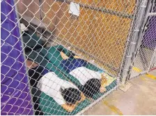  ?? ROSS D. FRANKLIN/ASSOCIATED PRESS ?? Two female detainees sleep in a holding cell in June 2014. President Trump wrongly blamed Democrats for the separation of migrant children from parents while liberal activists tweeted misleading photos.