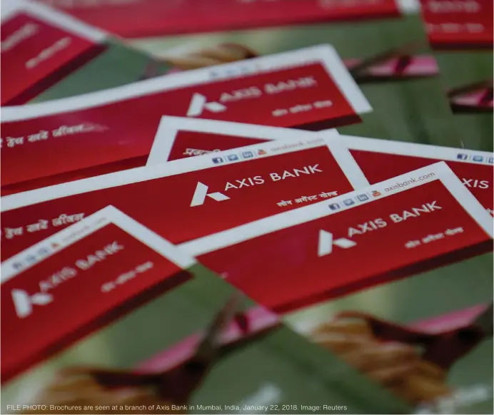  ?? ?? FILE PHOTO: Brochures are seen at a branch of Axis Bank in Mumbai, India, January 22, 2018. Image: Reuters