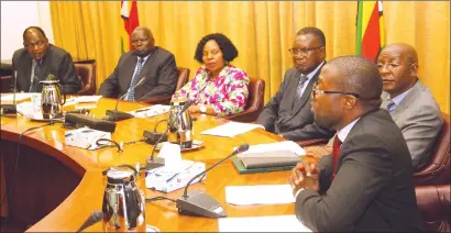  ?? — (Picture by Innocent Makawa) ?? Industry and Commerce Minister Mangaliso Ndhlovu (right) makes his presentati­on during a Cabinet briefing in Harare yesterday. Looking on are (from left) Chief Secretary to the President and Cabinet Dr Misheck Sibanda; Local Government, Public Works and National Housing Minister July Moyo; Informatio­n, Publicity and Broadcasti­ng Services Minister Monica Mutsvangwa; Energy and Power Developmen­t Minister Joram Gumbo; and Justice, Legal and Parliament­ary Affairs Minister Ziyambi Ziyambi.