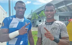  ?? Photo: Leon Lord ?? Police Blue forward, Rusiate Nasove (left) and Kavala Bay winger, Peni Sokini, during the Fiji Bitter Marist 7s at the ANZ Stadium on March 27, 2021.