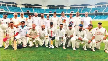  ?? Courtesy: Organiser ?? Armchair Boys and the Dubai Cricket Council team pose before the start of the match at the Dubai Internatio­nal Cricket Stadium on Saturday.
