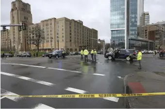  ??  ?? BUSY INTERSECTI­ON: The intersecti­on of Brookline Avenue and Park Drive is shut down as state police investigat­e Friday’s crash.