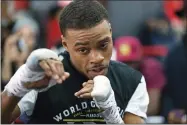  ?? AP FILE PHOTO ?? Errol Spence Jr. warms up during a work out on Jan. 17 at Gleason’s Gym in the Brooklyn borough of New York. The 2012 U.S. Olympian will defend his IBF crown tonight back home in Texas, against Mexico’s Carlos Ocampo in a mandatory defense between undefeated fighters.