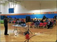  ?? RECORD FILE PHOTO ?? Jerry Ford, one of the founders of the Team H.E.R.O. program at the Troy Boys & Girls Club, talks about the program during an event recognizin­g Rev. Martin Luther King Jr. Day.