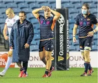  ??  ?? Dejection: Edinburgh players after the defeat by Ulster