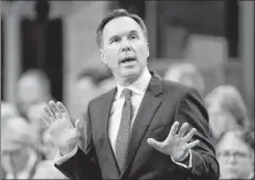  ?? CP PHOTO ?? Finance Minister Bill Morneau speaks during question period in the House of Commons on Parliament Hill, in Ottawa on Tuesday.