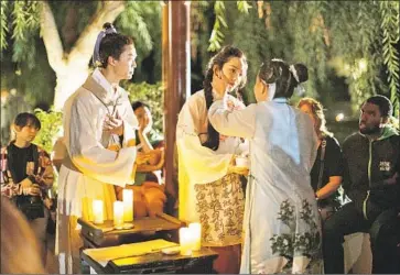  ?? Rafael Hernandez ?? “NIGHTWALK in the Chinese Garden,” with Hao Feng and Jessika Van, unfolds outdoors at the Huntington.