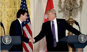  ?? AP ?? US President Donald Trump and Canadian Prime Minister Justin Trudeau during their joint news conference in the East Room of the White House —