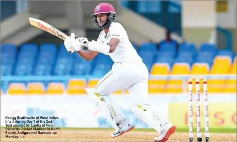  ?? AFP ?? Kraigg Brathwaite of West Indies hits 4 during Day 1 of the 2nd
Test against Sri Lanka at Vivian Richards Cricket Stadium in North Sound, Antigua and Barbuda, on Monday.