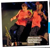  ??  ?? Johnny and his Juluka bandmate Sipho Mchunu.