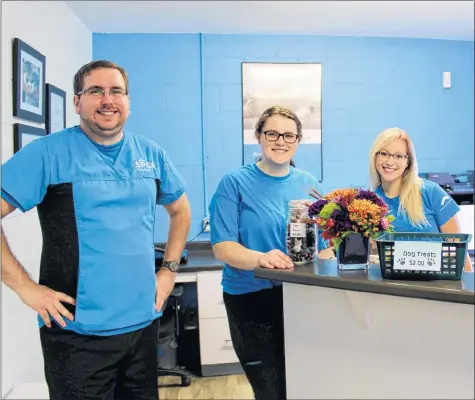  ??  ?? Animal care attendant Ryan Doucette, veterinari­an technologi­st Alicia Weare and animal control cruelty officer Alana Hurlbert at the Yarmouth SPCA.