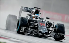  ?? AFP ?? McLaren driver Fernando Alonso finished seventh in last week’s Hungary Grand Prix. —