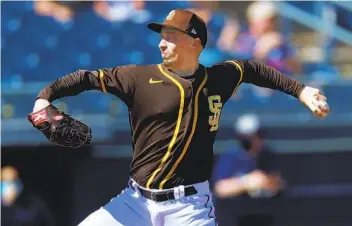  ?? K.C. ALFRED U-T ?? Blake Snell pitches a hitless inning in his spring debut, and stares down the umpire after a ball call.