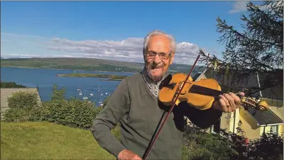  ??  ?? Duncan MacGilp makes beautiful violins in a tiny workshop in his garden overlookin­g Tobermory, below, Duncan playing one of his first violins, which he made for his daughter, with his 10th one in the making.