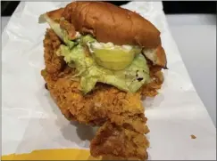  ?? PHOTO BY MERRILL SHINDLER ?? Mom's Original, served at the South Korean fried chicken chain Mom's Touch, is a tasty entry in the fried chicken sandwich competitio­n in the Long Beach area.