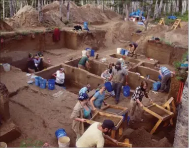  ?? BEN POTTER — UNIVERSITY OF ALASKA VIA ASSOCIATED PRESS ?? In this August 2013 photo provided by the University of Alaska, excavators work at the Upward Sun River discovery site in Alaska. According to a report released on Wednesday, Jan. 3, 2018, DNA from an infant who died in Alaska some 11,500 years ago,...