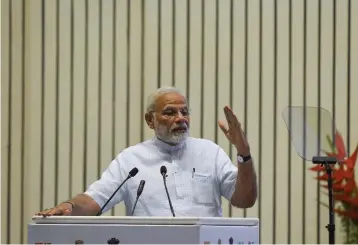  ?? — AFP ?? Prime Minister Narendra Modi gestures as he speaks during a plenary session on the occasion of World Environmen­t Day in New Delhi on Tuesday