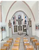  ?? ?? Die Nikolaus-Kapelle steht inmitten des Kirchgarte­ns.