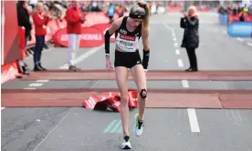  ?? Of April. Photograph: Shuttersto­ck ?? Eilish McColgan, with tape on her injured knee, wins the Berlin half-marathon at the start