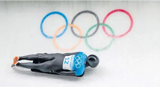  ?? ?? SLIPPERY SLOPE: Evgeniy Rukosuev of the Russian Olympic Committee competes in the skeleton at the 2022 Winter Olympics.
