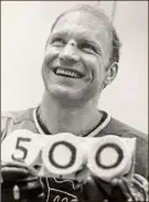  ?? Fred Jewell / Associated Press ?? Bobby Hull of the Chicago Blackhawks holds pucks denoting his 500th career goal on Feb. 22, 1970. Hull has died at age 84.