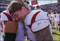  ?? Democrat-Gazette file photo ?? Arkansas offensive lineman Hjalte Froholdt’s mother Lisa grew up in New Zealand and her family has roots in Tonga, which Froholdt pays homage to with an intricate warrior-style tattoo on his left shoulder and down his arm.